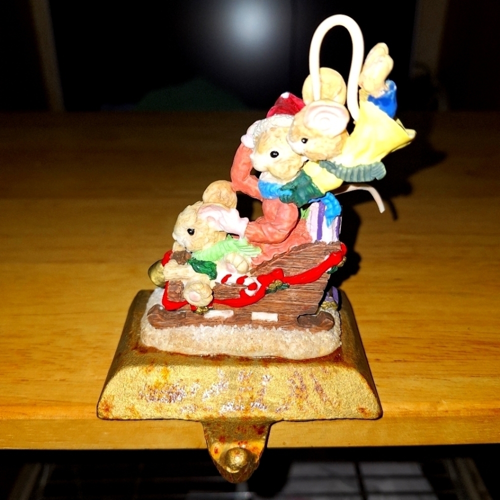 An unbranded Mouse and sleigh stocking holder. The base is 3.75"x2.5" and 5 tall